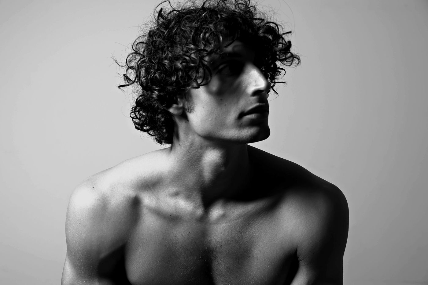 Dramatic side-lit profile
